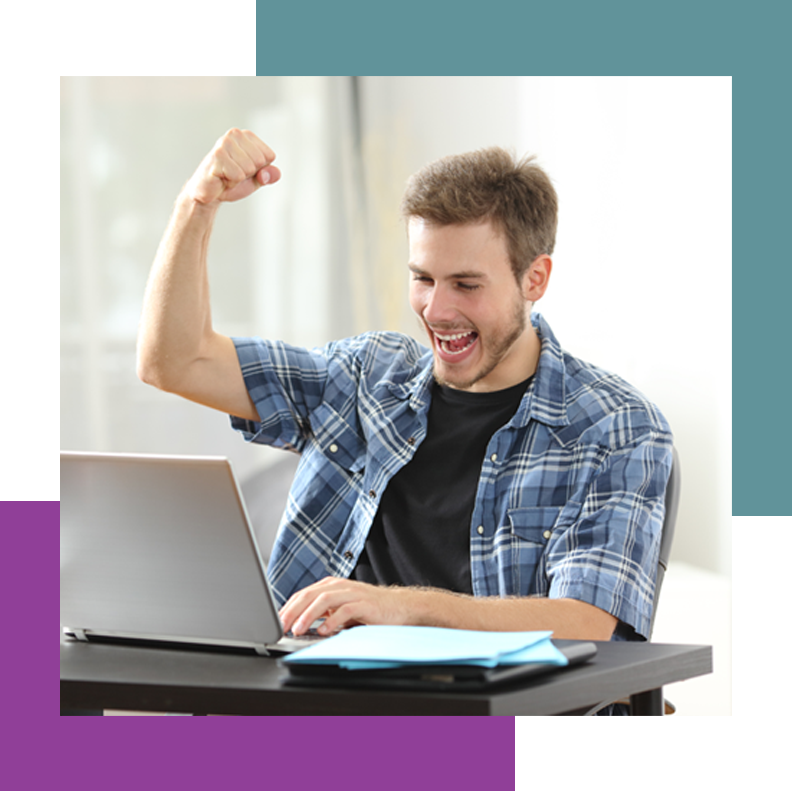 Man celebrating on laptop